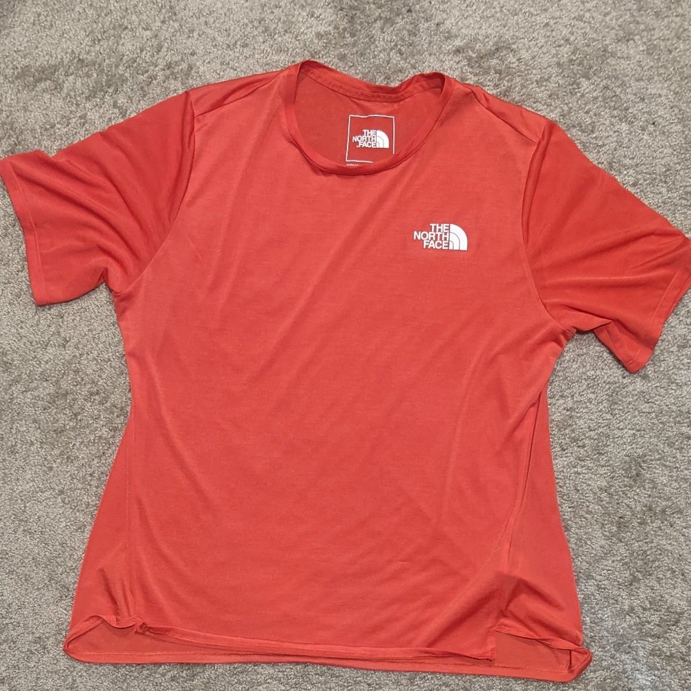The North Face red shirt